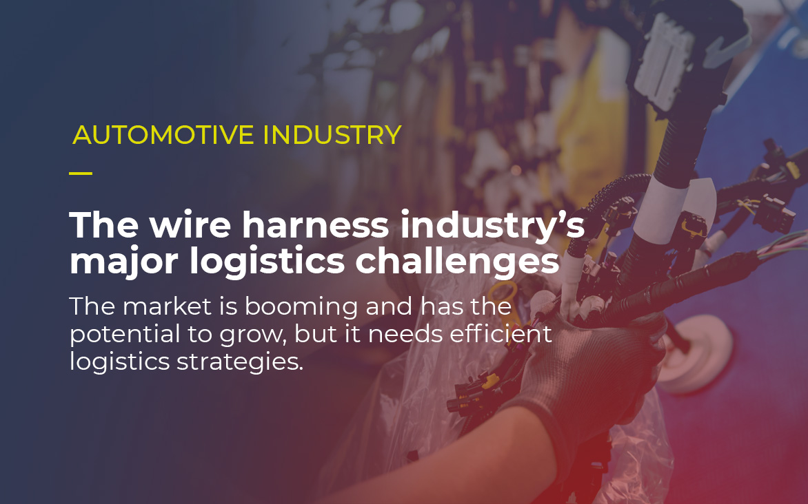 Over the picture of a worker assemblying a wire harness to a car, it is written AUTOMOTIVE INDUSTRY The wire harness industry’s major logistics challenges The market is booming and has the potential to grow, but it needs efficient logistics strategies.